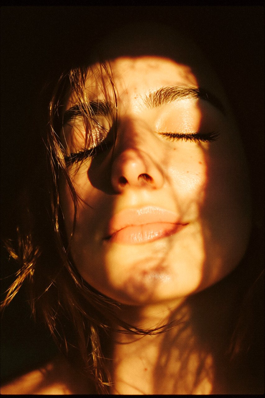 Perennial campaign film: a face turned up into warm morning light